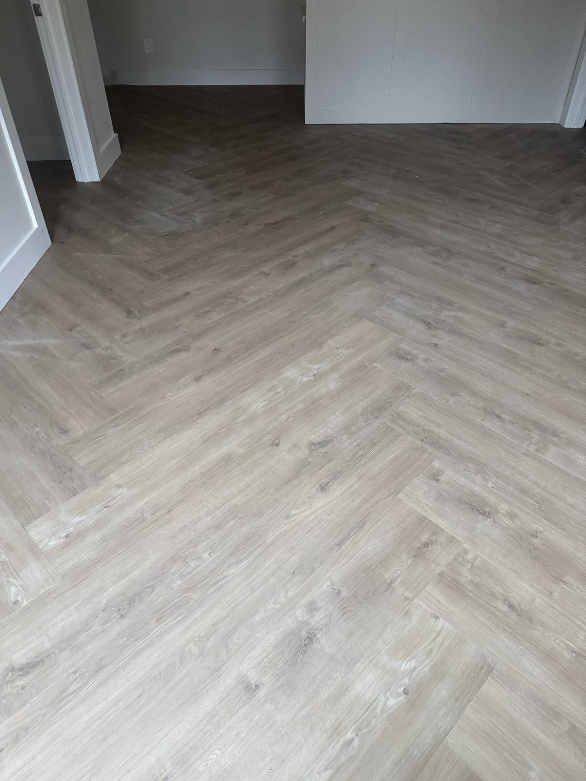 Luxury vinyl plank flooring installed across a great room